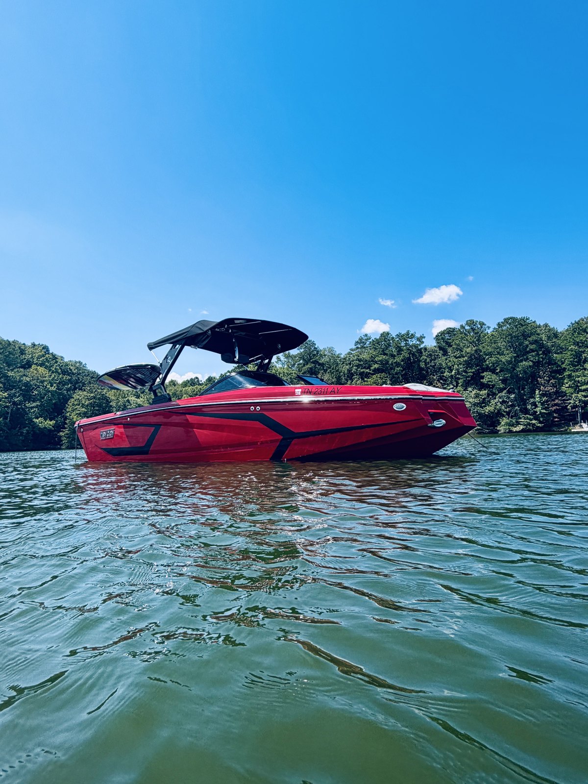 Our red Heyday surf boat on Pickwick Lake